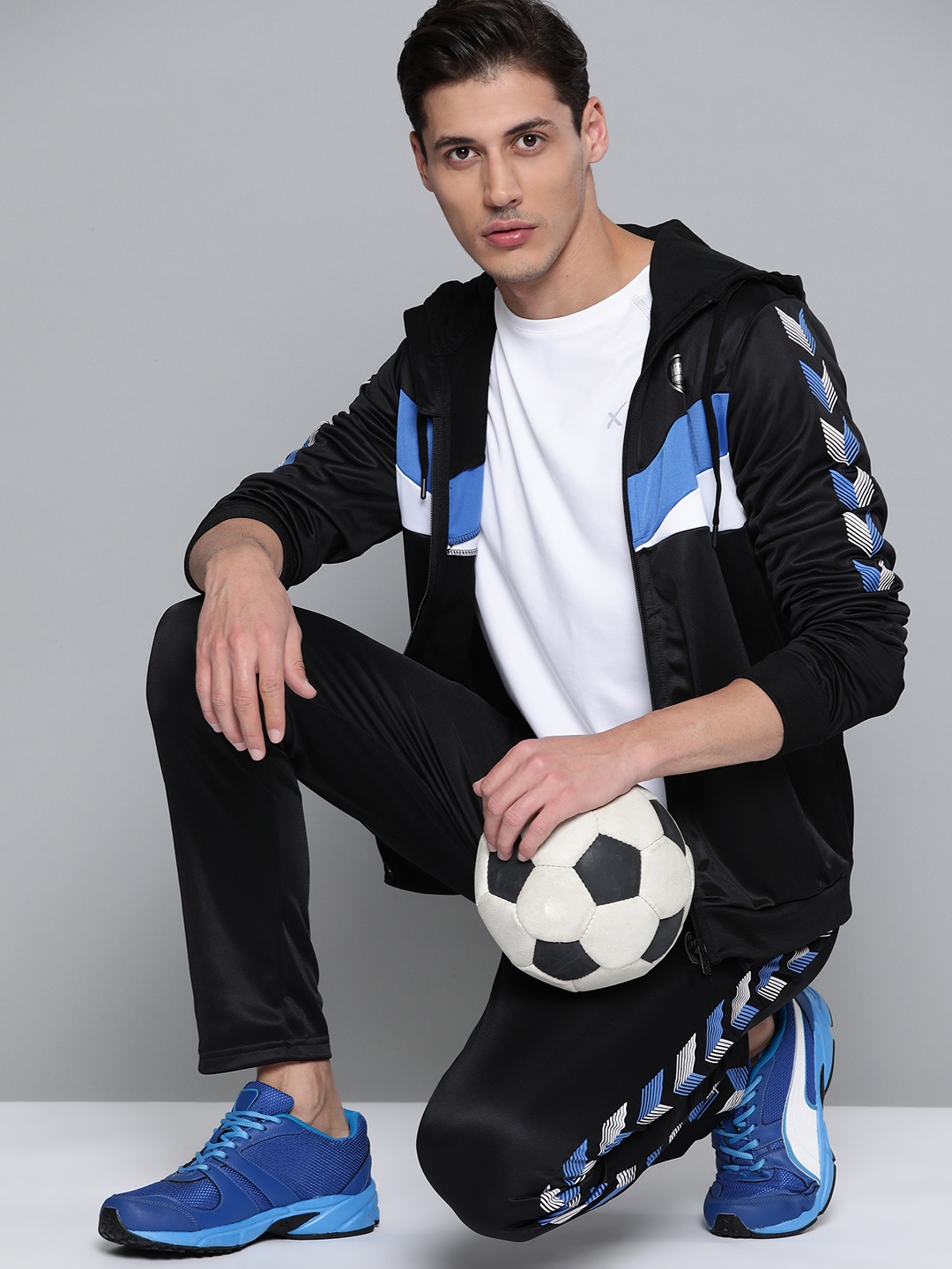 

HRX By Hrithik Roshan Football Men Jet Black Rapid-Dry Solid Tracksuits