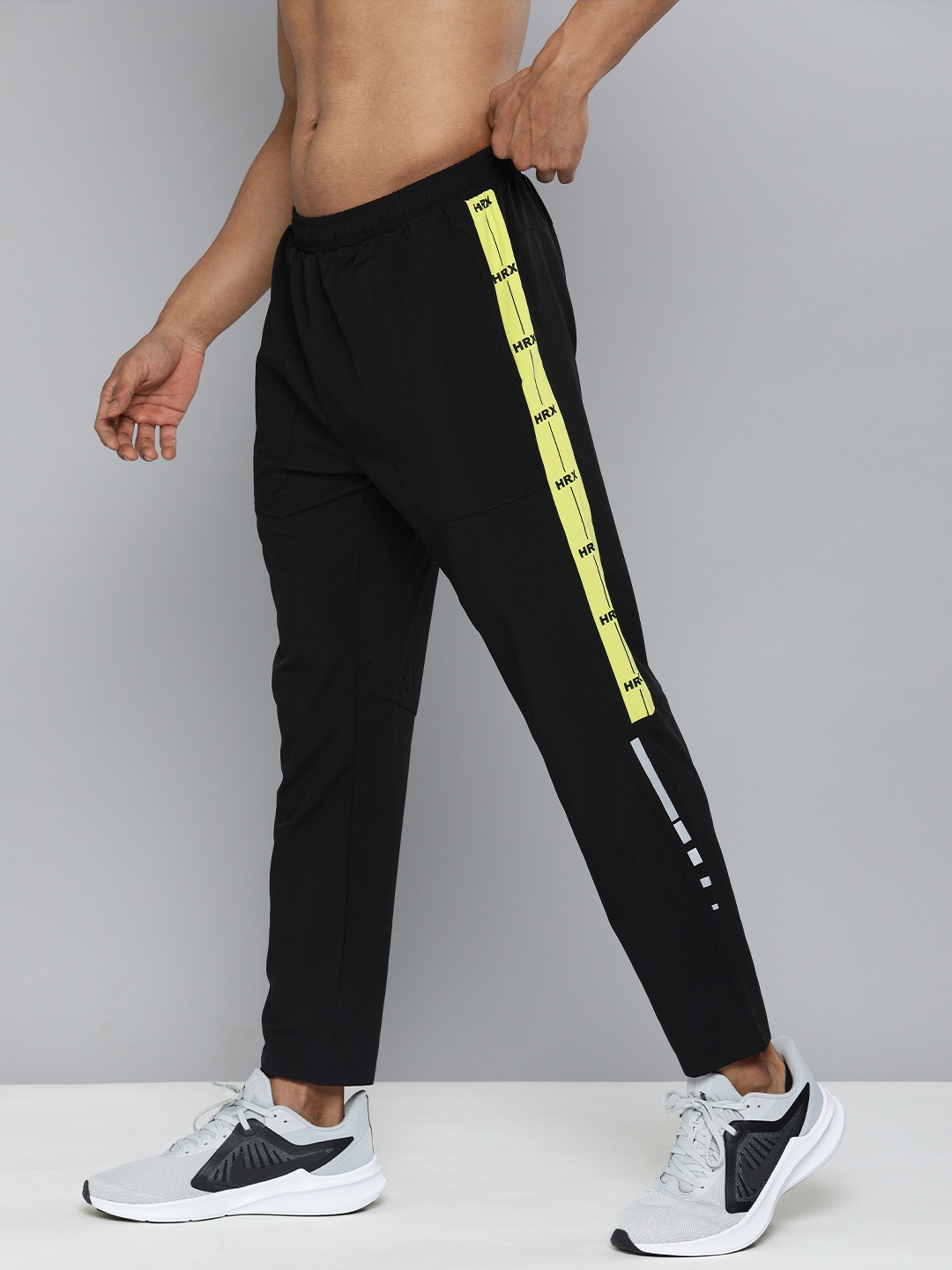 

HRX By Hrithik Roshan Men Jet Black & F.light Slim Printed Rapid-Dry Running Track Pants