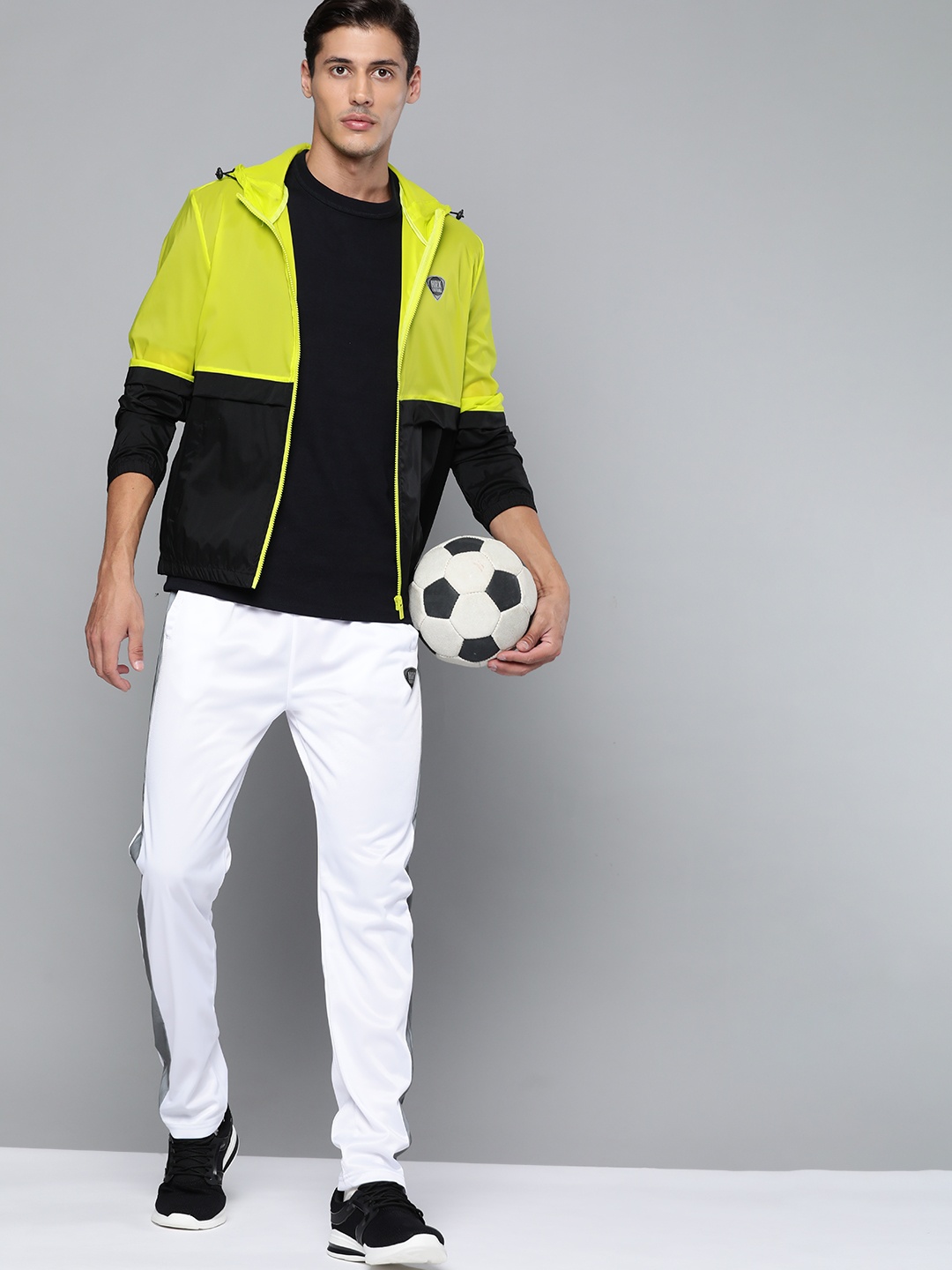 

HRX By Hrithik Roshan Yellow & Black Football Men light Rapid-Dry Solid Jackets, Fluorescent green