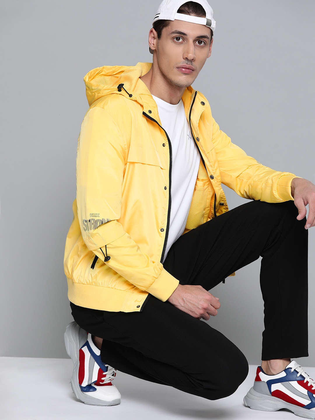 

HRX by Hrithik Roshan Lifestyle Men Lemon Drop Rapid-Dry Solid Jacket, Yellow