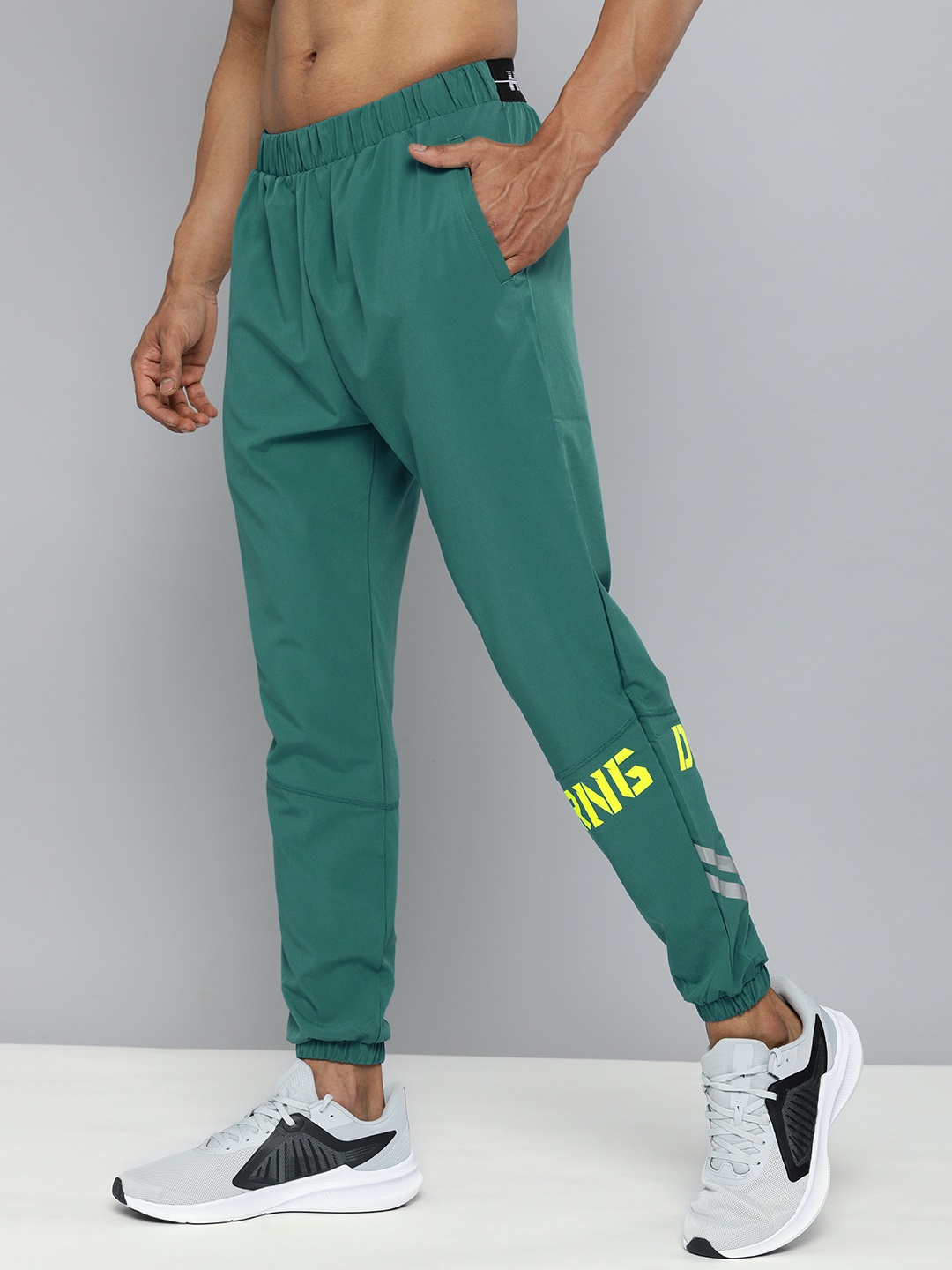 

HRX By Hrithik Roshan Men Verdigris Slim Fit Brand Carrier Rapid-Dry Training Joggers, Teal