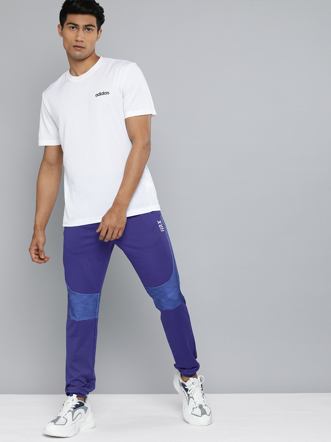 

HRX By Hrithik Roshan Men Mazarine Blue Slim Fit Brand Carrier Rapid-Dry Training Joggers