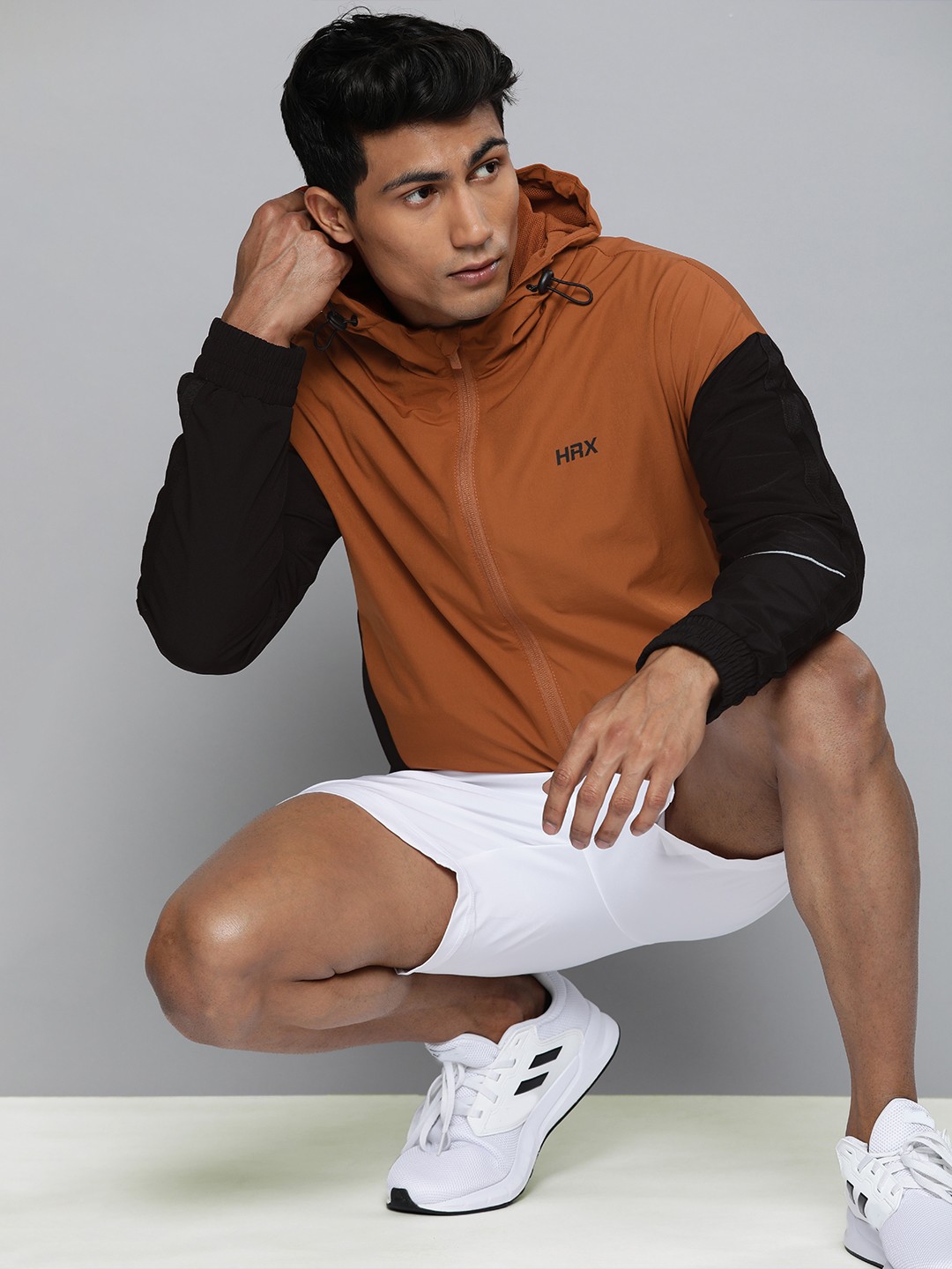 

HRX By Hrithik Roshan Training Men Rust Orange Rapid-Dry Solid Jackets
