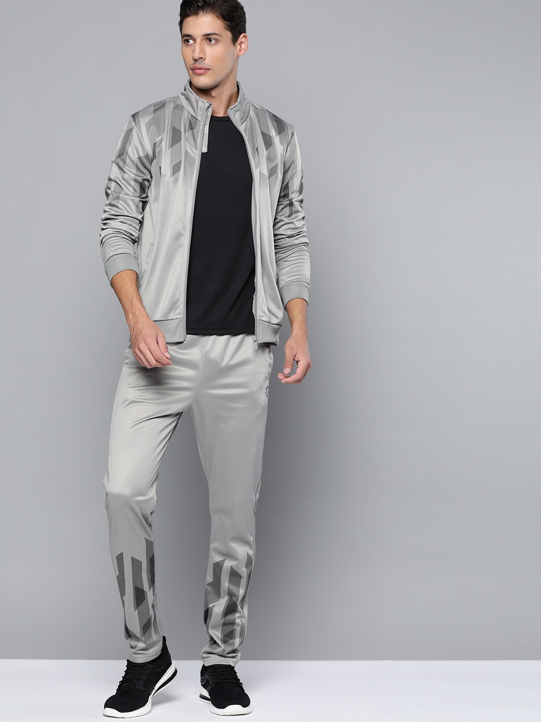 

HRX By Hrithik Roshan Football Men Wet Weather Rapid-Dry Solid Tracksuits, Grey