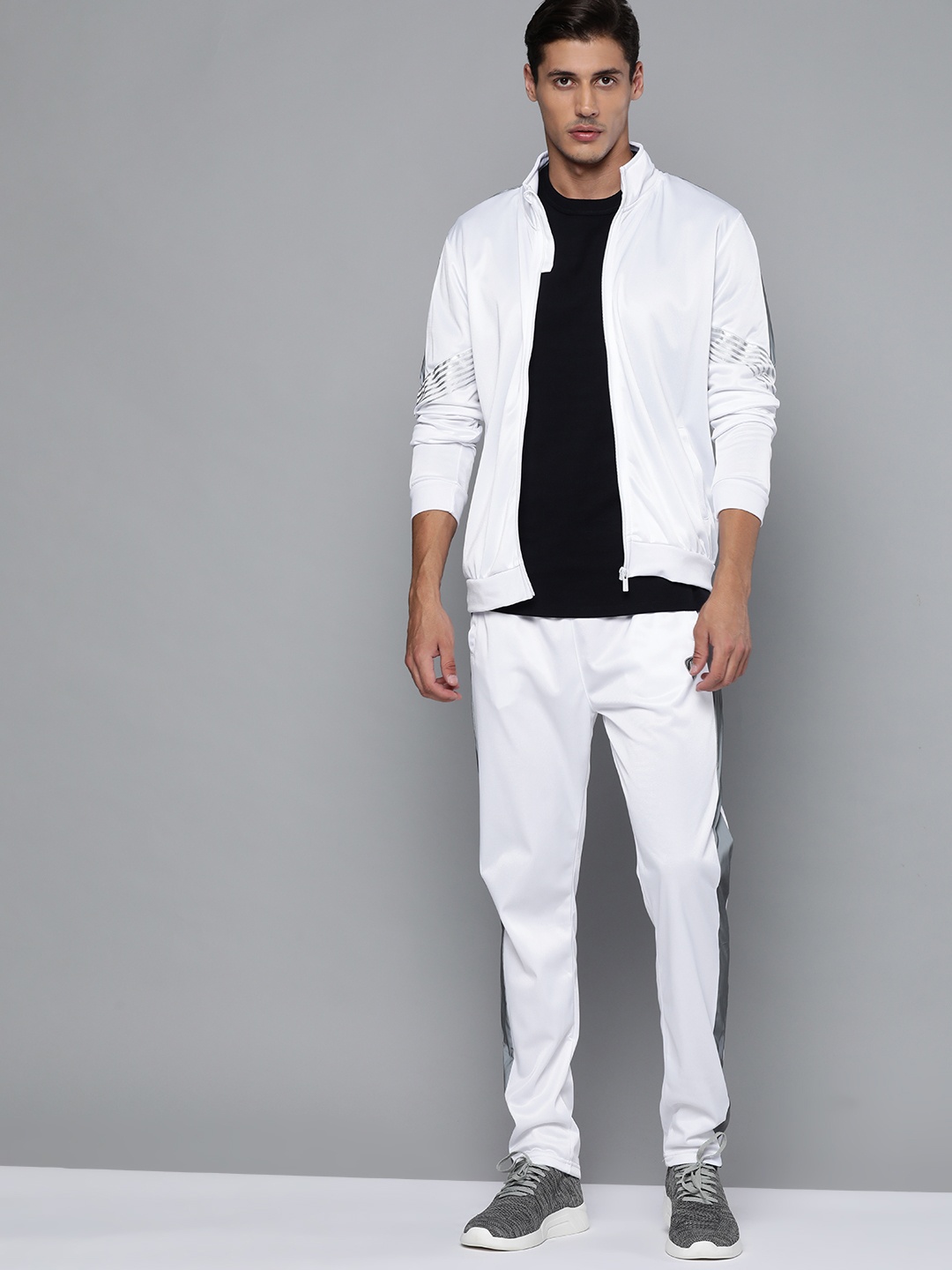 

HRX By Hrithik Roshan Football Men optic white Rapid-Dry Solid Tracksuits