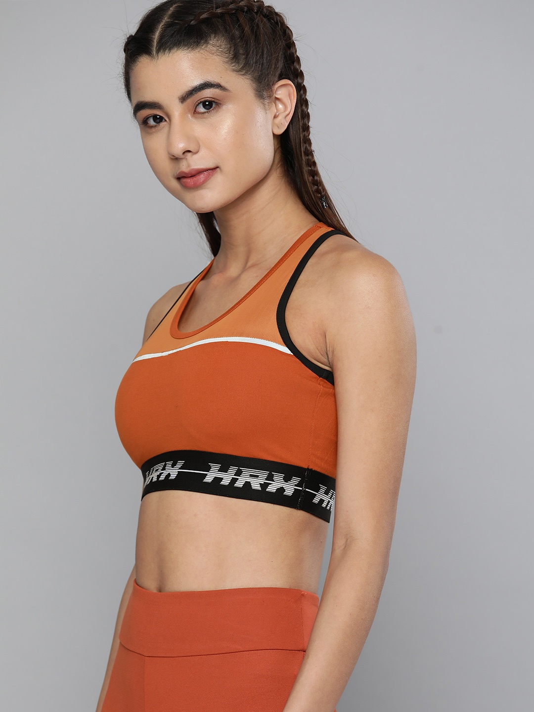 

HRX By Hrithik Roshan Women Soap Nut Rapid-Dry Solid Running Sports Bra, Orange