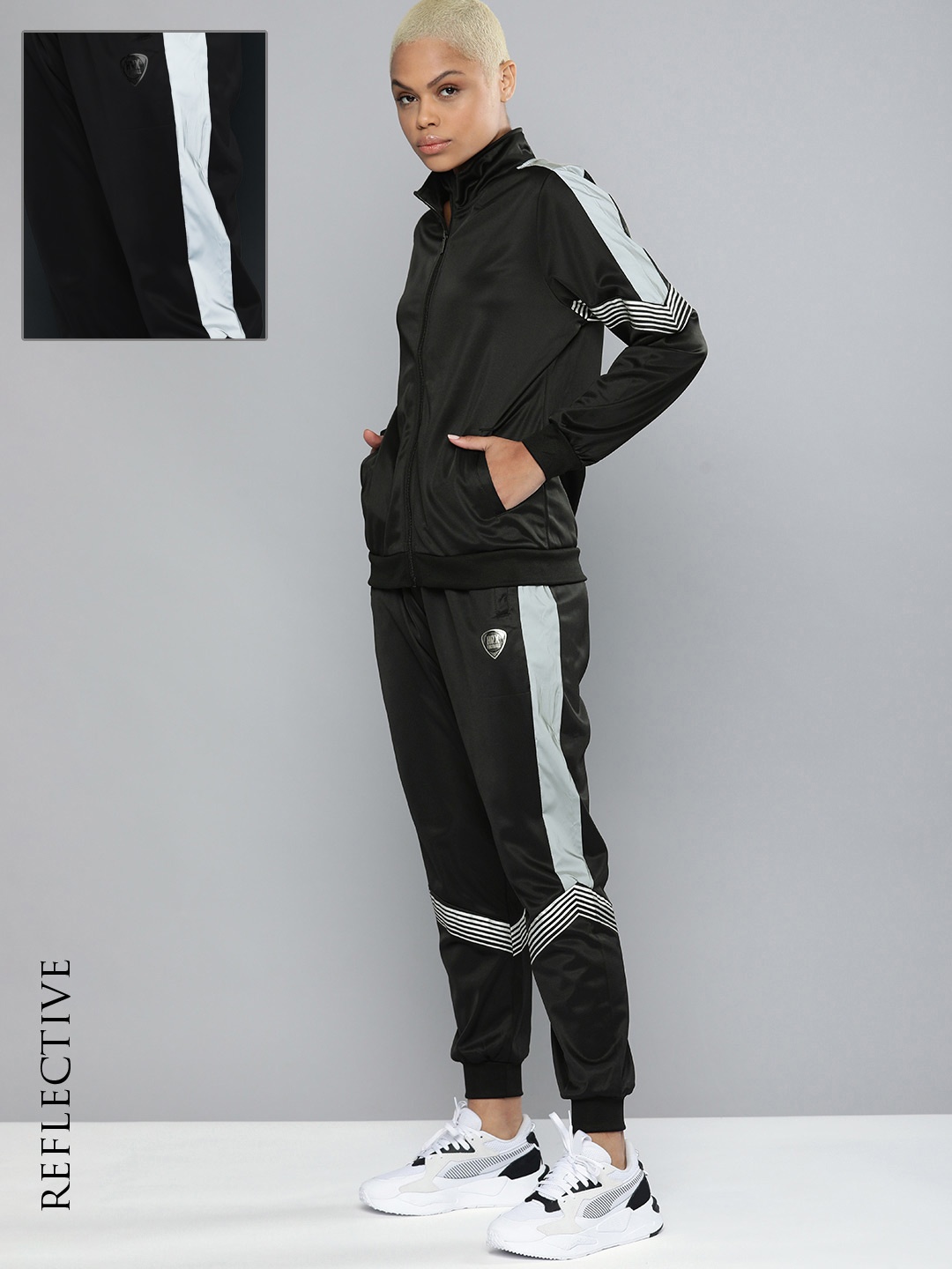 

HRX By Hrithik Roshan Football Women optic white Rapid-Dry Solid Tracksuits, Black