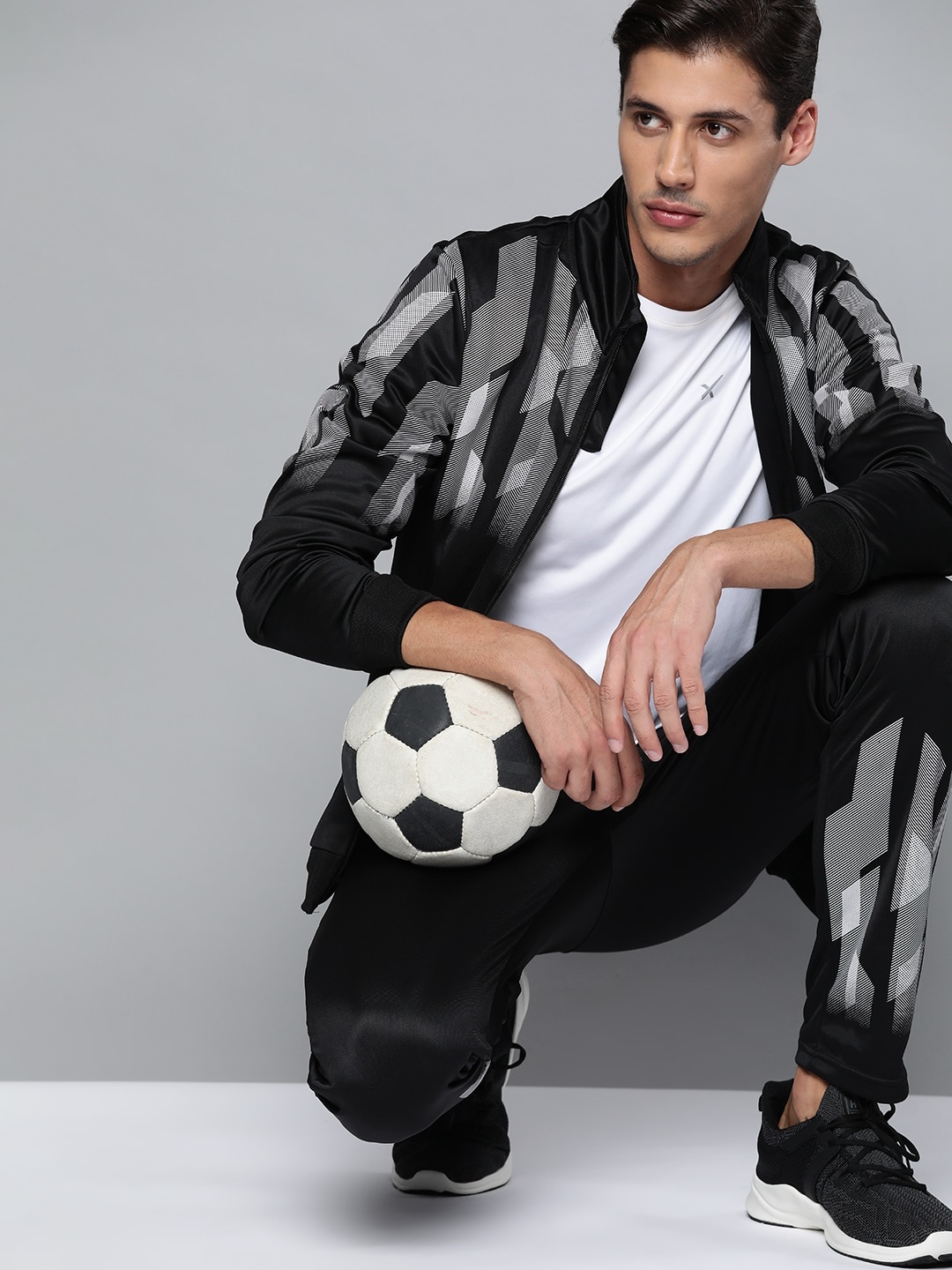 

HRX By Hrithik Roshan Football Men Jet Black Rapid-Dry Solid Tracksuits