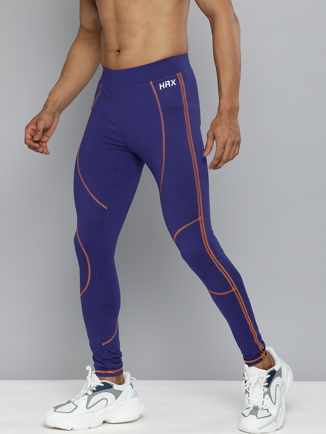 

HRX by Hrithik Roshan Men Blue & Orange Striped Training Tights