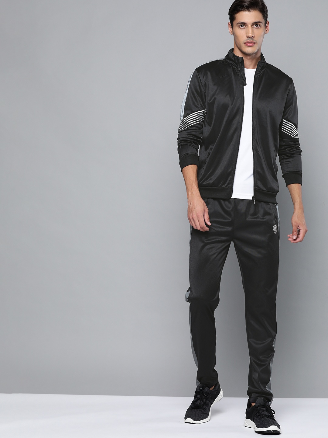 

HRX By Hrithik Roshan Football Men Jet Black Rapid-Dry Solid Tracksuits