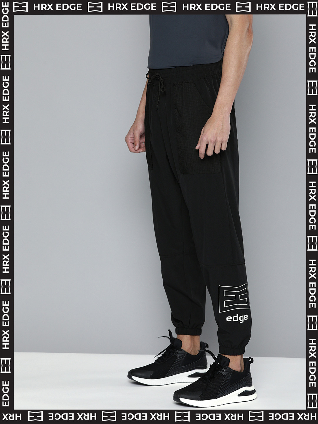 

HRX By Hrithik Roshan EDGE Lifestyle Men Jet Black Bio-Wash Solid Track Pants