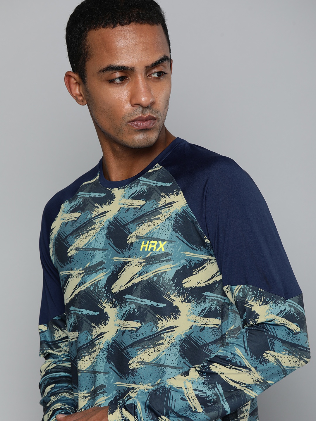 

HRX By Hrithik Roshan Training Men Blue and Cream-Coloured Rapid-Dry AOP Tshirts