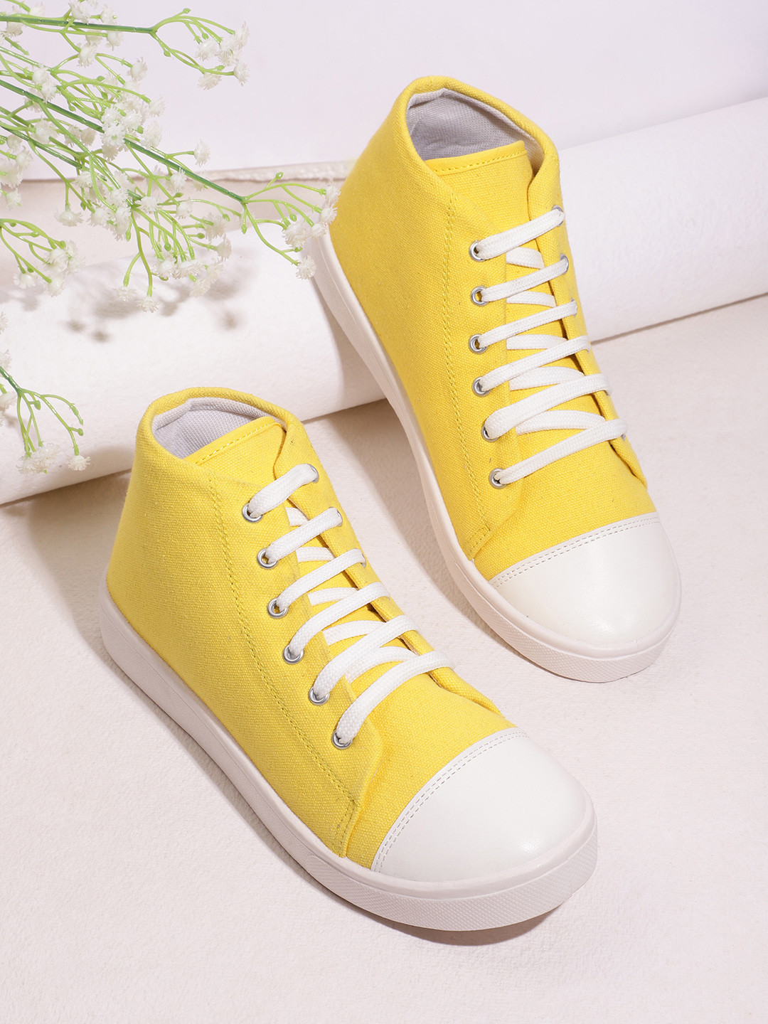 

DressBerry Women Yellow Solid Mid-Top Sneakers