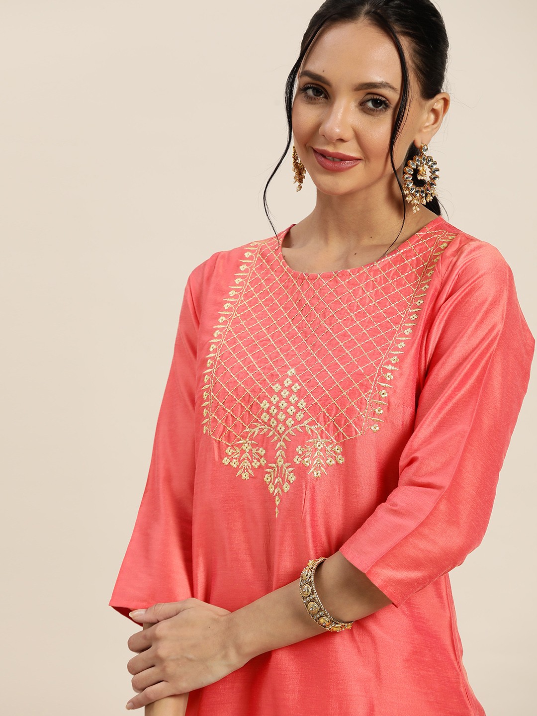 

Sangria Women Pink & Golden Ethnic Yoke Design Thread Work Kurta with Trousers