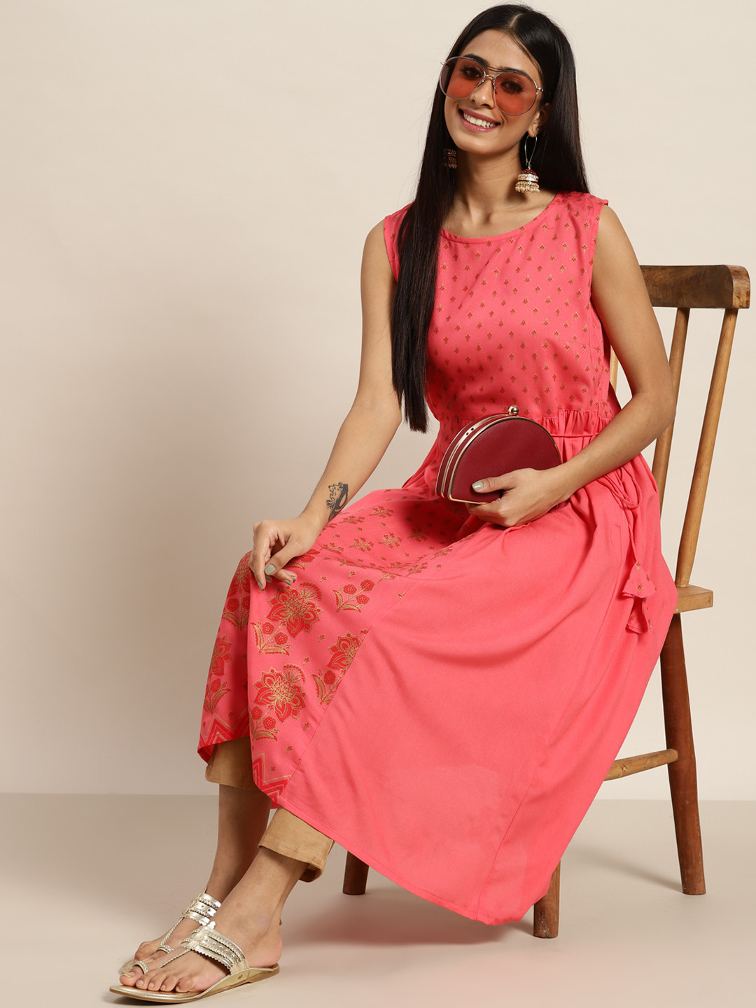 

Sangria Women Pink & Golden Ethnic Motifs Printed A-Line Kurta