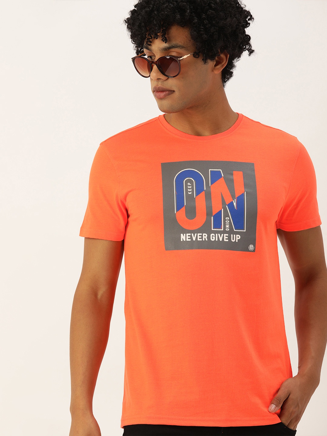 

PETER ENGLAND UNIVERSITY Men Orange Typography Slim Fit Pure Cotton T-shirt