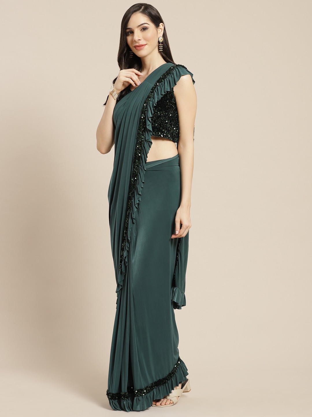 

Mitera Teal Green Sequinned Ready to Wear Saree with Stitched Blouse