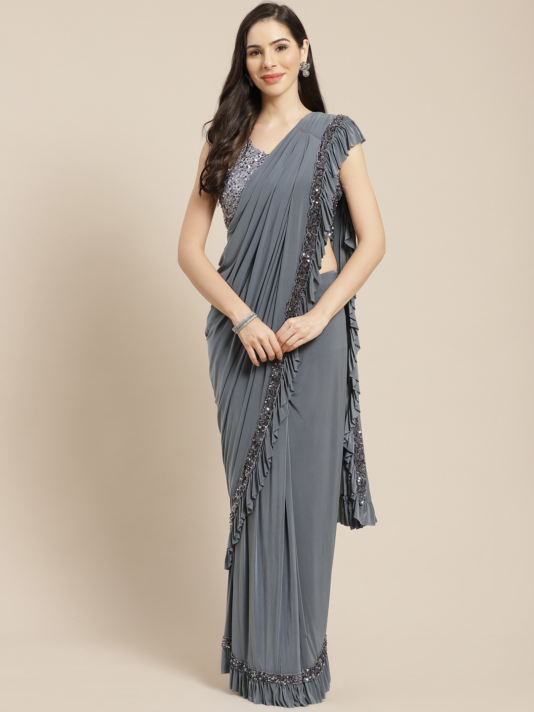 

Mitera Grey Solid Ruffled Ready to Wear Saree