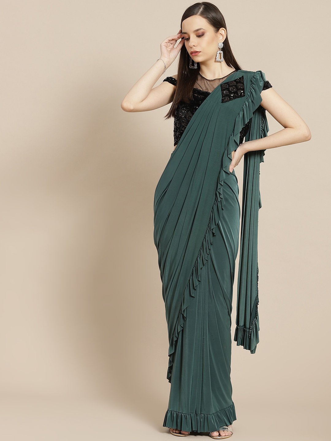 

Mitera Green Solid Sequinned Ruffled Ready to Wear Saree
