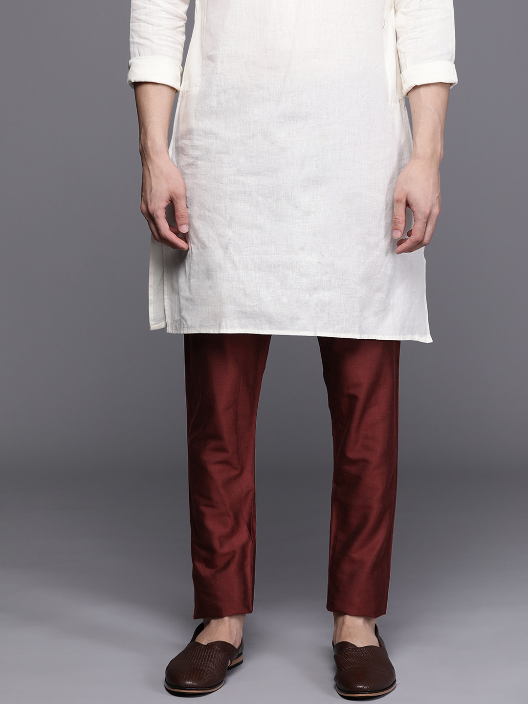 

Manyavar Men Maroon Solid Pencil Fit Cotton Pyjamas