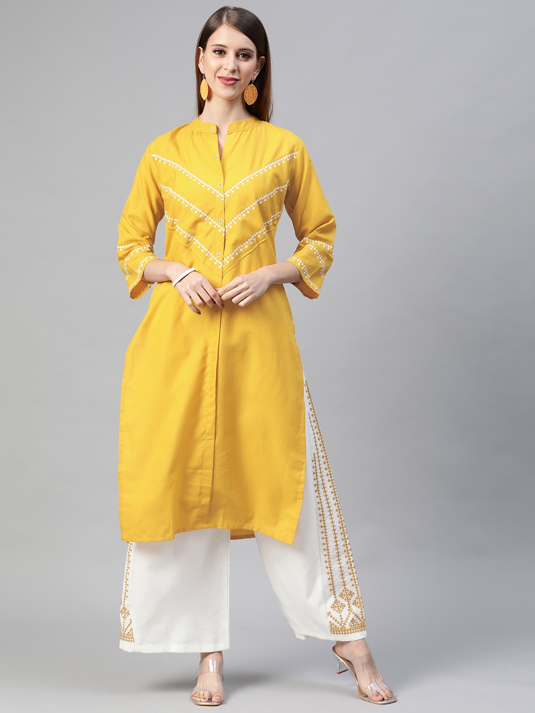 

AHIKA Women Mustard Yellow Yellow Yoke Design Panelled Thread Work Kurta with Palazzos