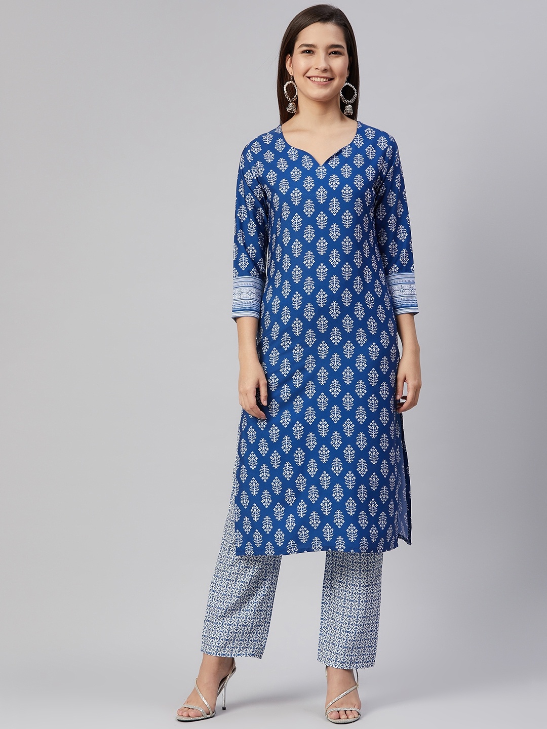 

AHIKA Women Blue & White Ethnic Motifs Printed Kurta with Palazzos