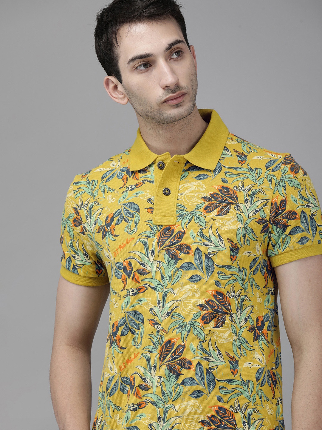 

U.S. Polo Assn. Denim Co. Men Mustard Yellow Floral Print Pure Cotton Polo Collar Pure Cotton T-shirt