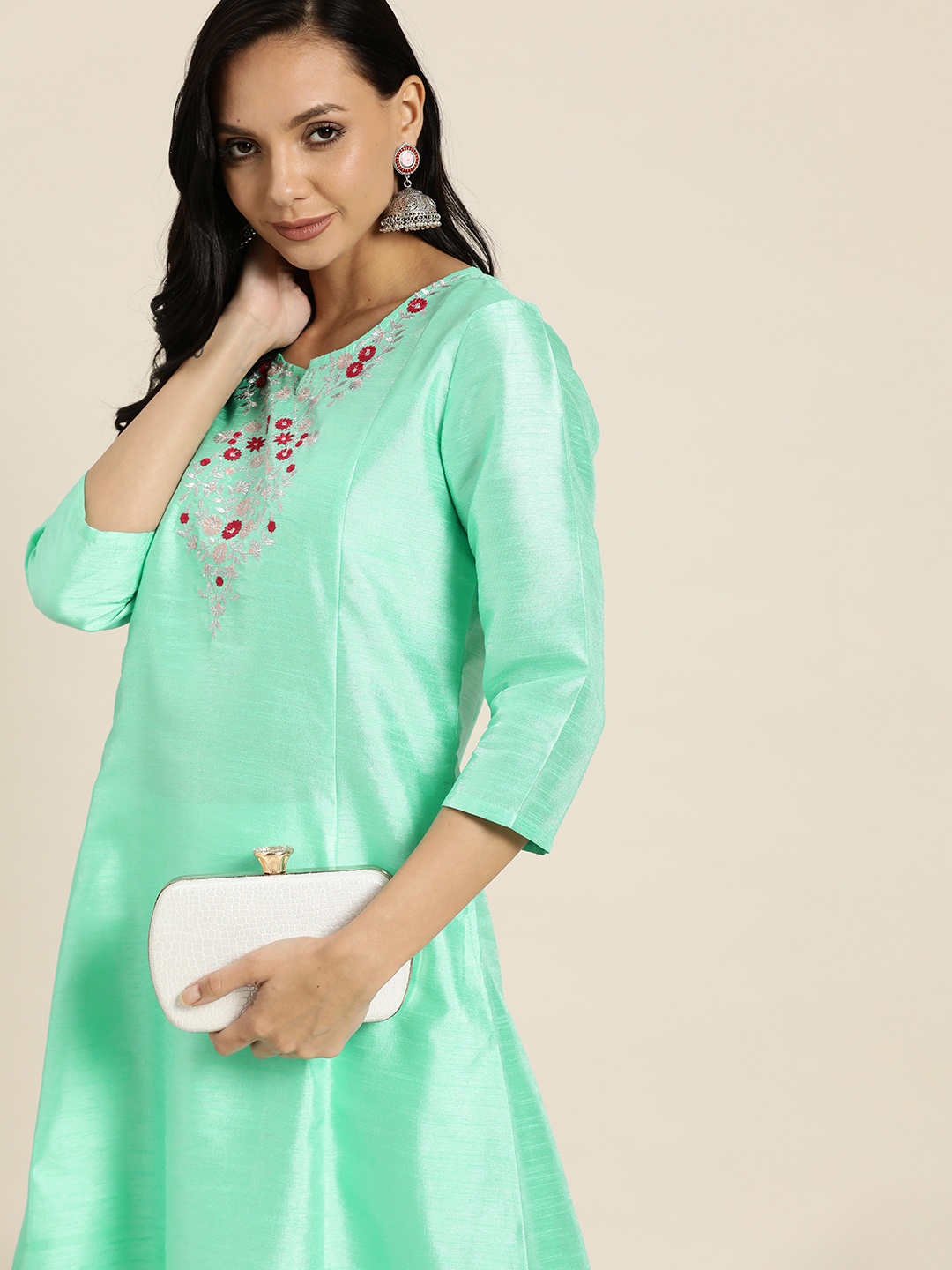 

Sangria Women Green Ethnic Motifs Yoke Design Panelled Thread Work Kurta with Trousers