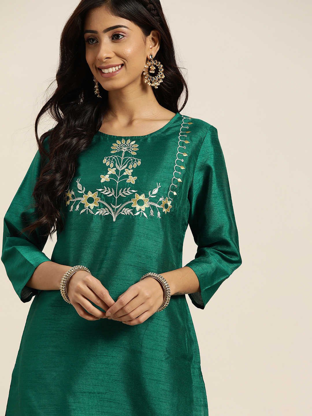 

Sangria Women Green & Golden Ethnic Motifs Yoke Design Regular Kurta with Trousers