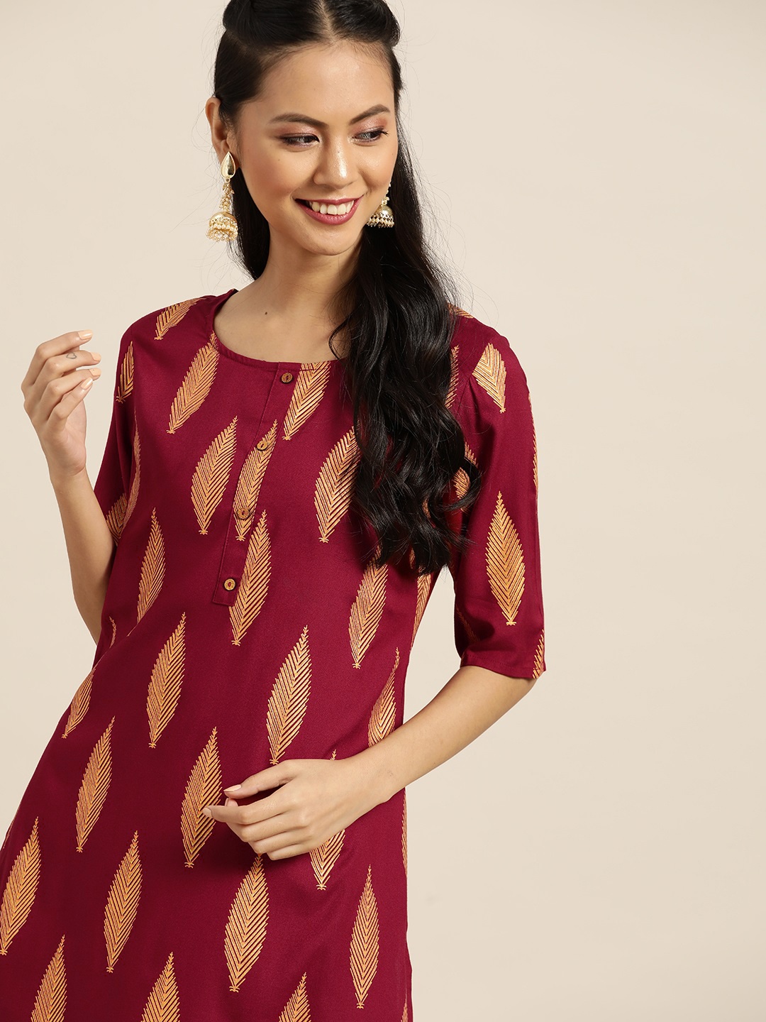 

Sangria Women Maroon & Golden Ethnic Motifs Printed Kurta with Trousers