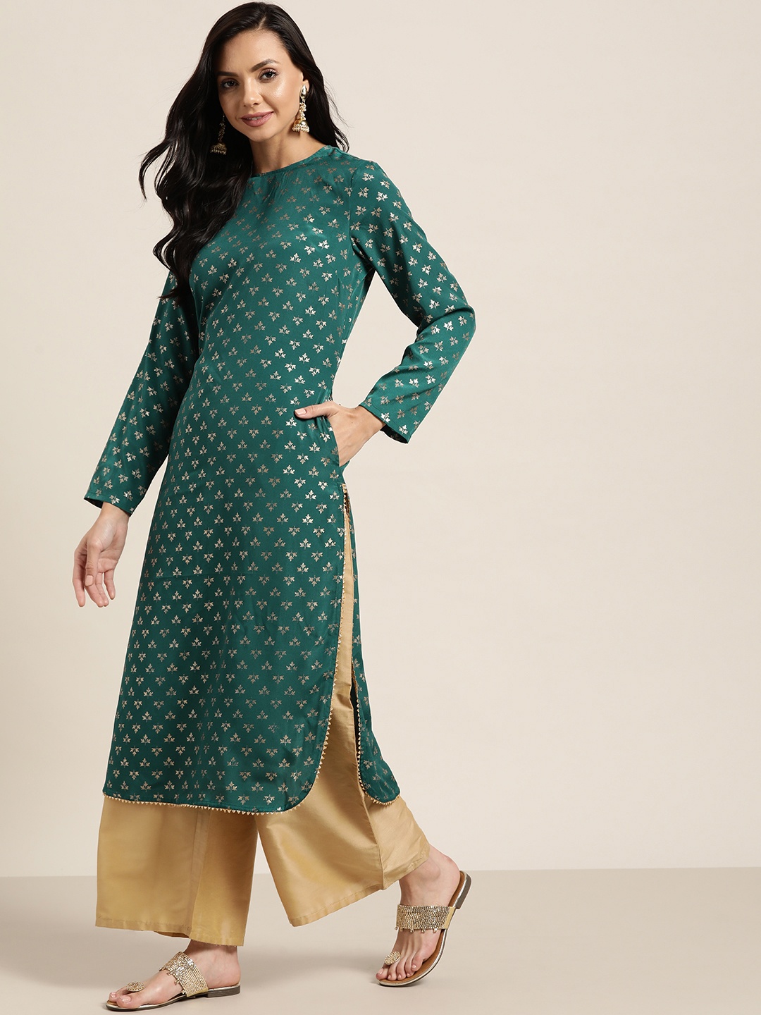

Sangria Women Teal & Golden Ethnic Motifs Printed Gotta Patti Straight Kurta
