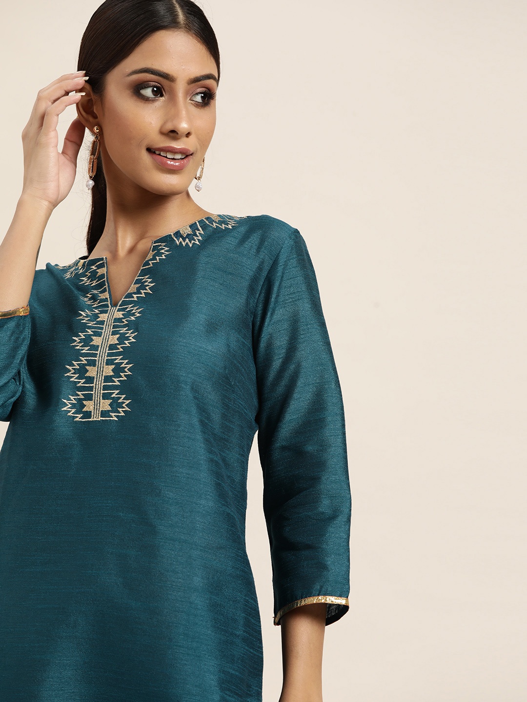 

Sangria Women Teal Blue & Golden Geometric Yoke Design Embroidered Straight Kurta