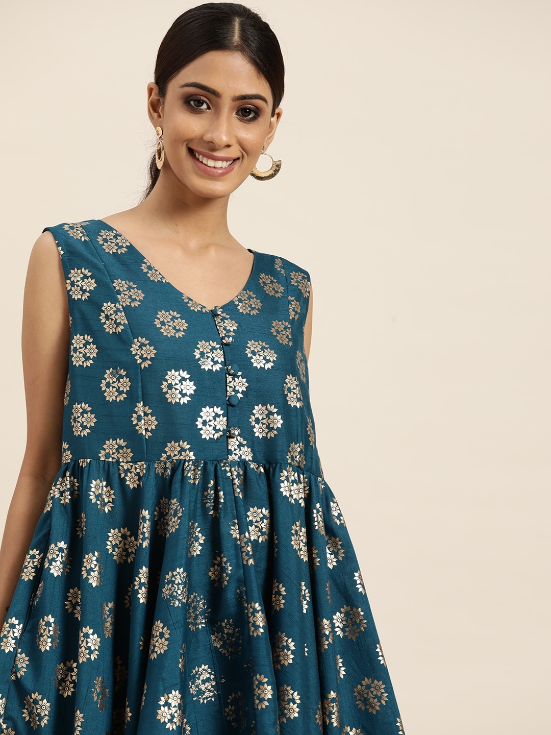 

Sangria Women Teal Blue & Golden Ethnic Motifs Printed A-Line Kurta