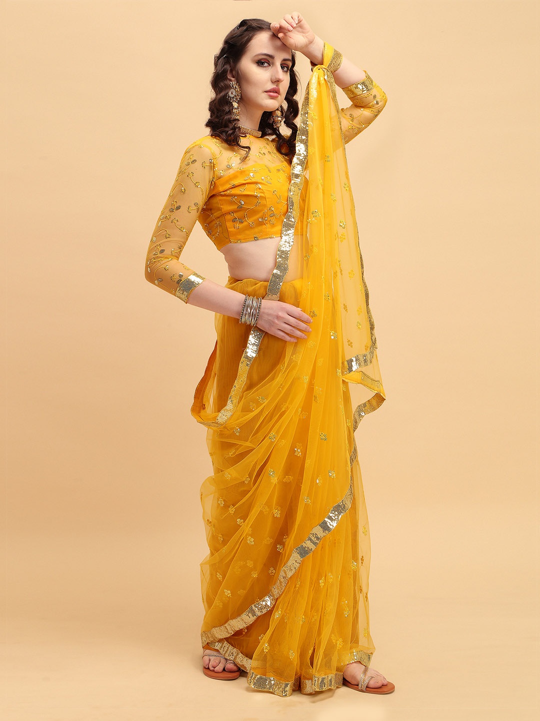 

Sangria Yellow & Gold-Toned Embellished Sequinned Supernet Saree