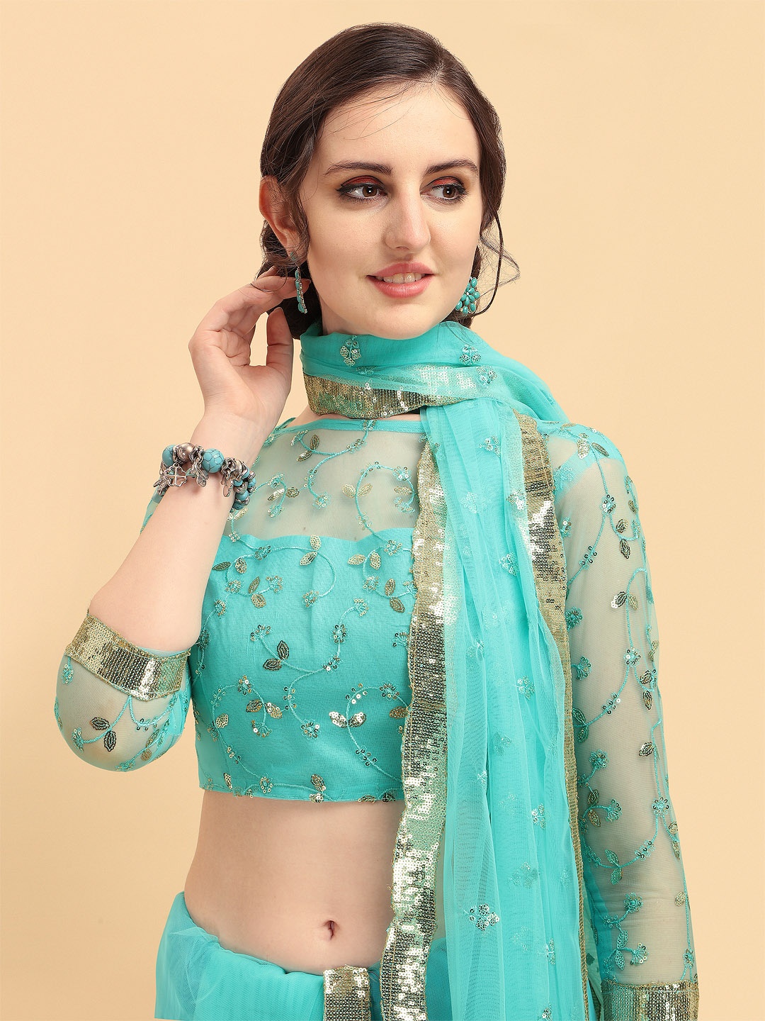 

Sangria Turquoise Blue Embellished Sequinned Supernet Heavy Work Saree