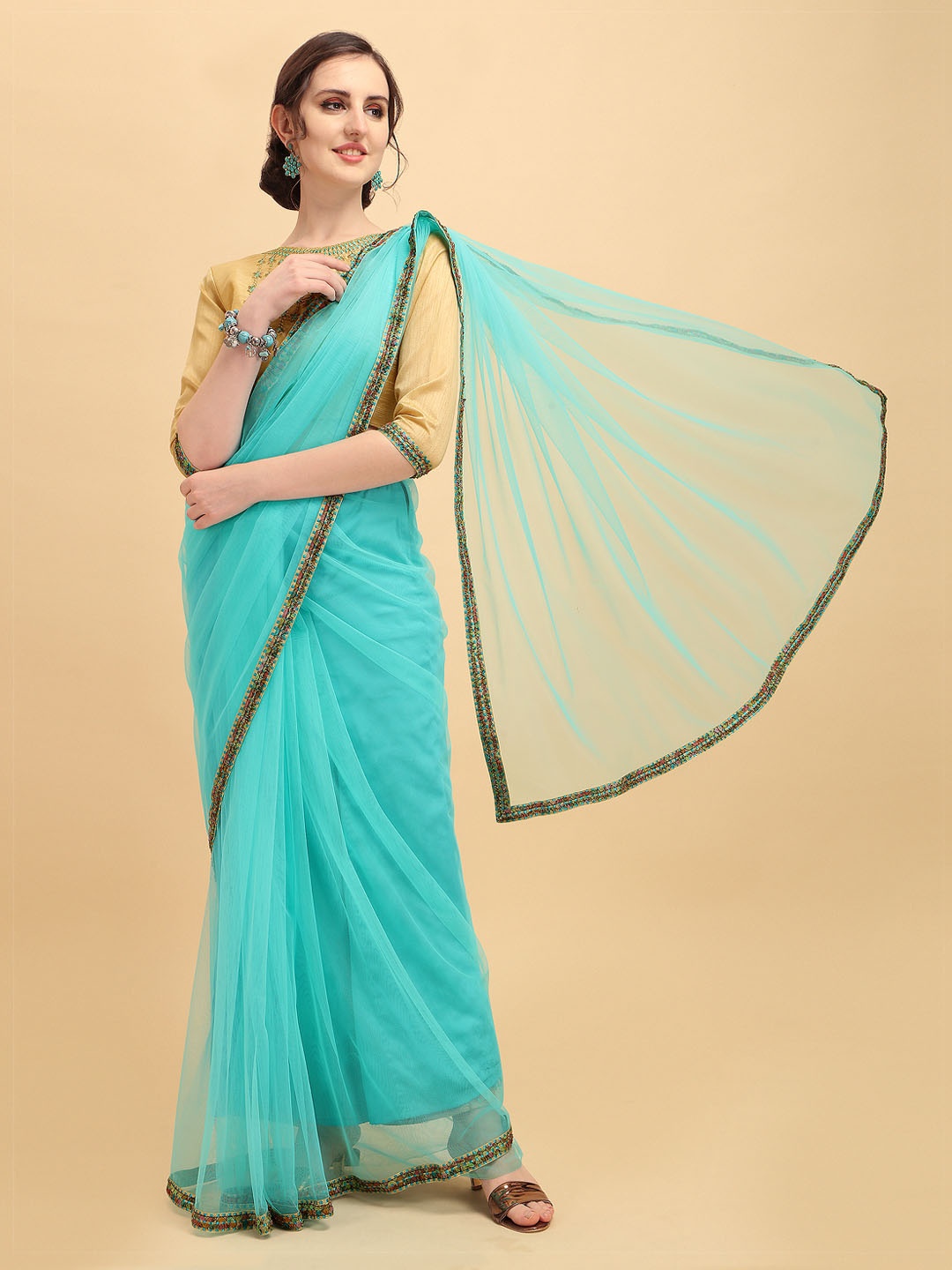 

Sangria Turquoise Blue Embroidered Supernet Saree