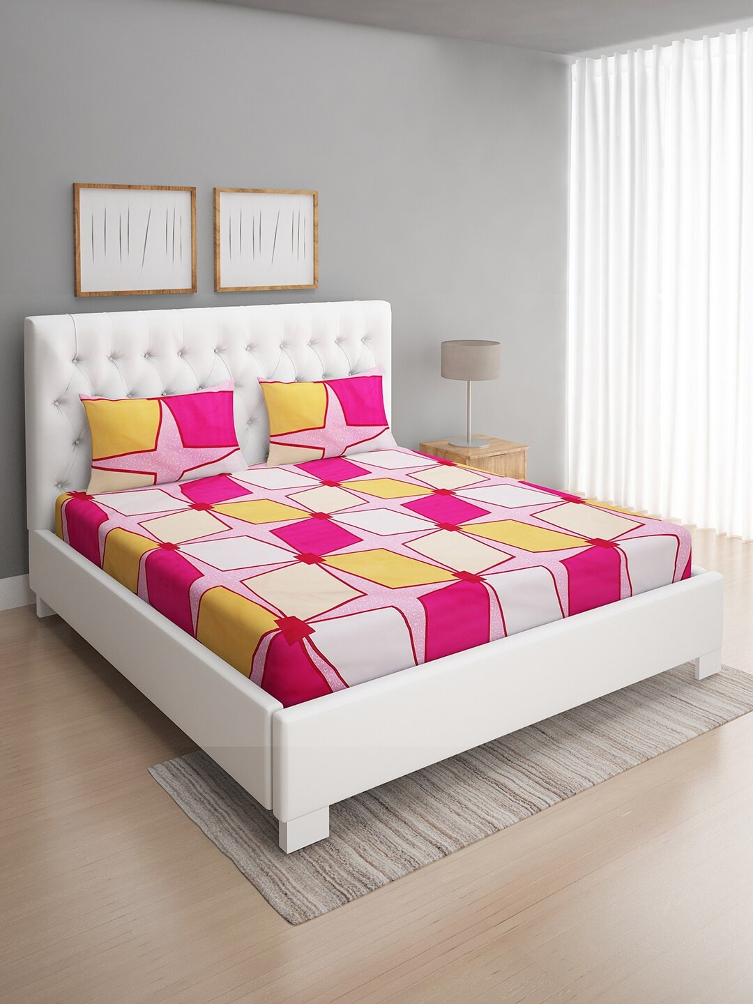 

ROMEE Pink & Yellow Geometric 144 TC Cotton Queen Bedsheet with 2 Pillow Covers