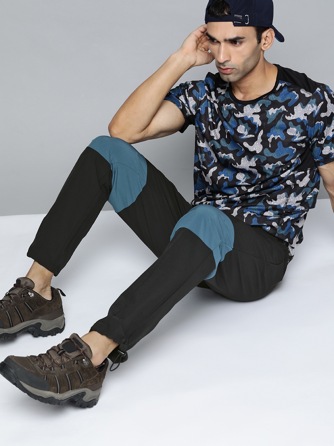 

HRX By Hrithik Roshan Outdoor Men Real Teal Lycra Colourblock Joggers, Black