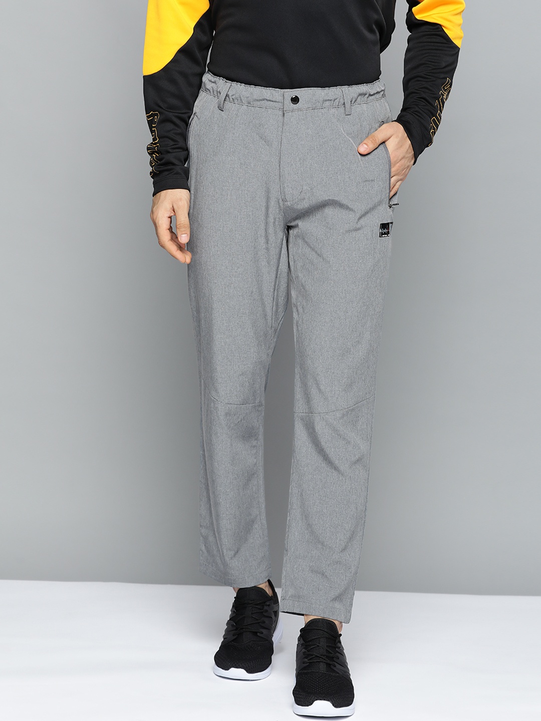 

HRX By Hrithik Roshan Lifestyle Men Grey Melange Lycra Solid Trousers