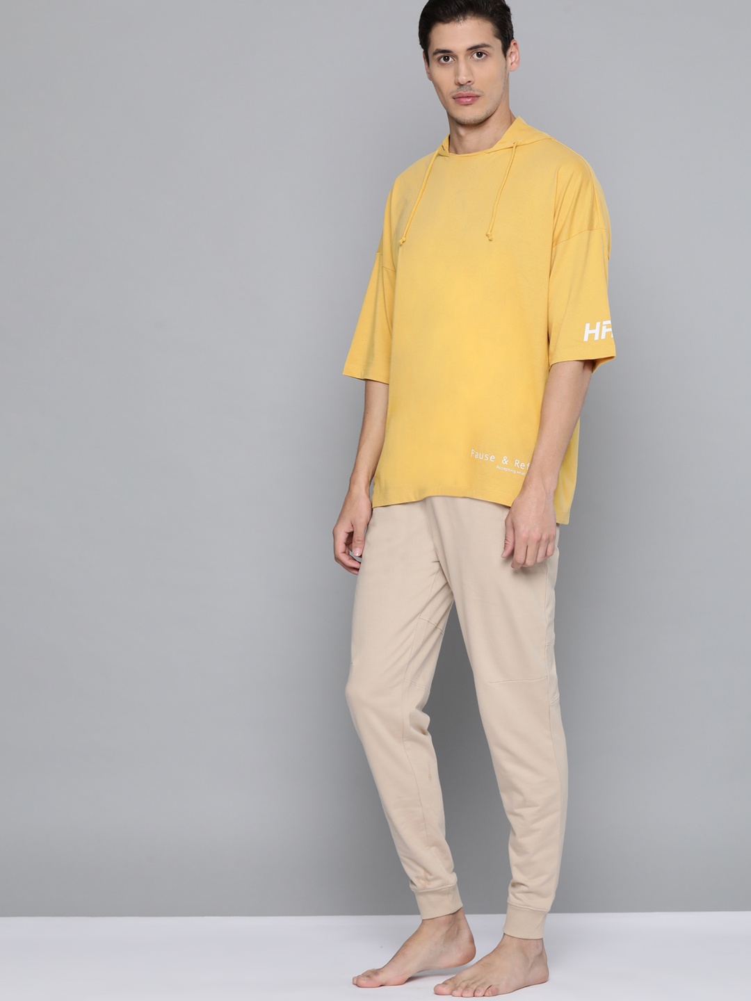 

HRX By Hrithik Roshan Yoga Men Ochre Rapid-Dry Solid Sustainable Tshirts, Yellow