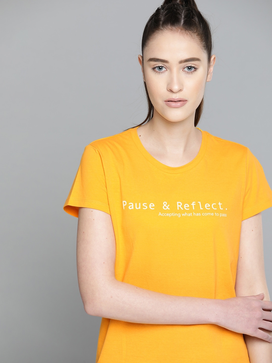 

HRX By Hrithik Roshan Yoga Women Saffron Solid Sustainable T-shirt, Yellow