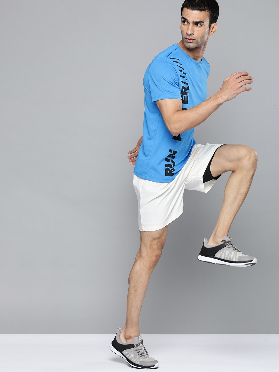 

HRX by Hrithik Roshan Men Blue & Black Typography Printed Running T-shirt