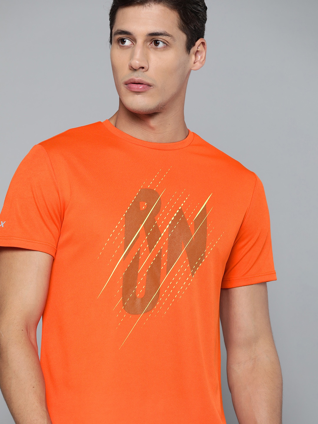 

HRX By Hrithik Roshan Running Men Neon Orange Rapid-Dry Typography T-shirt