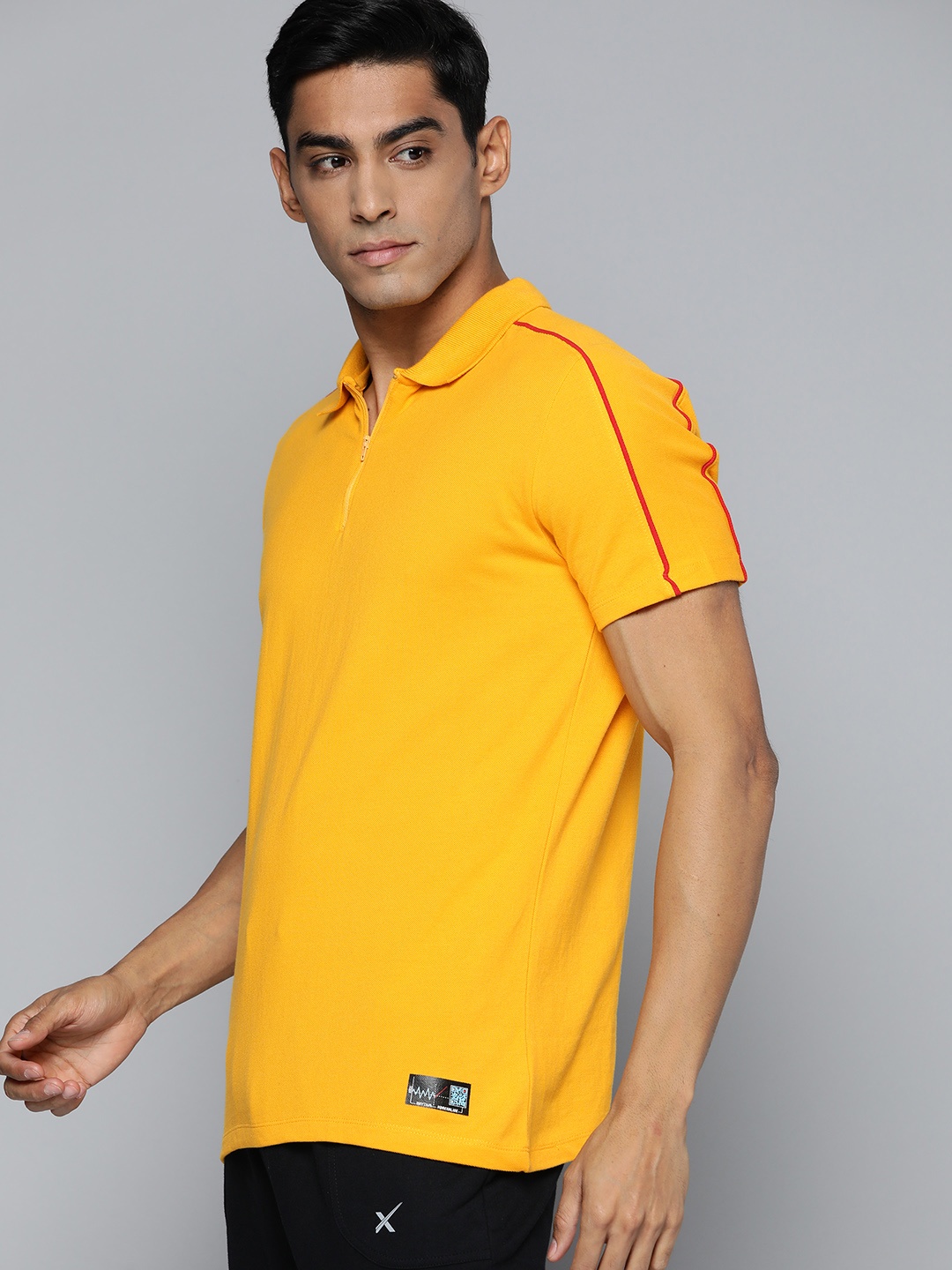 

HRX By Hrithik Roshan Lifestyle Men Electric Kumqut Bio-Wash Solid T-shirt, Yellow