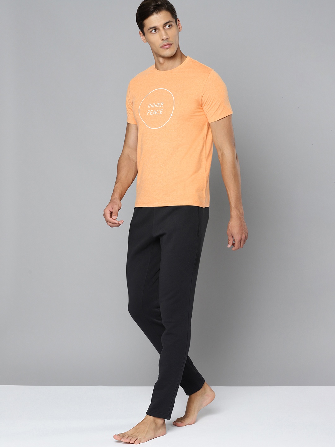 

HRX By Hrithik Roshan Yoga Men Orange Melange Typography Sustainable Tshirt, Peach