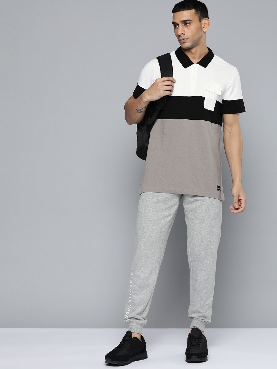 

HRX by Hrithik Roshan Men White & Black Striped Polo Collar Pure Cotton T-shirt