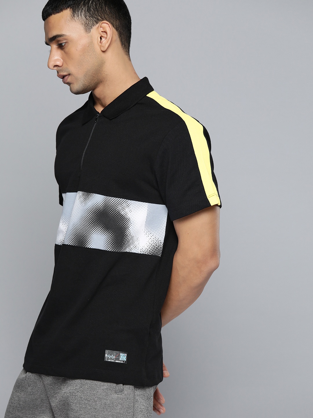 

HRX by Hrithik Roshan Men Black & Yellow Striped Polo Collar T-shirt