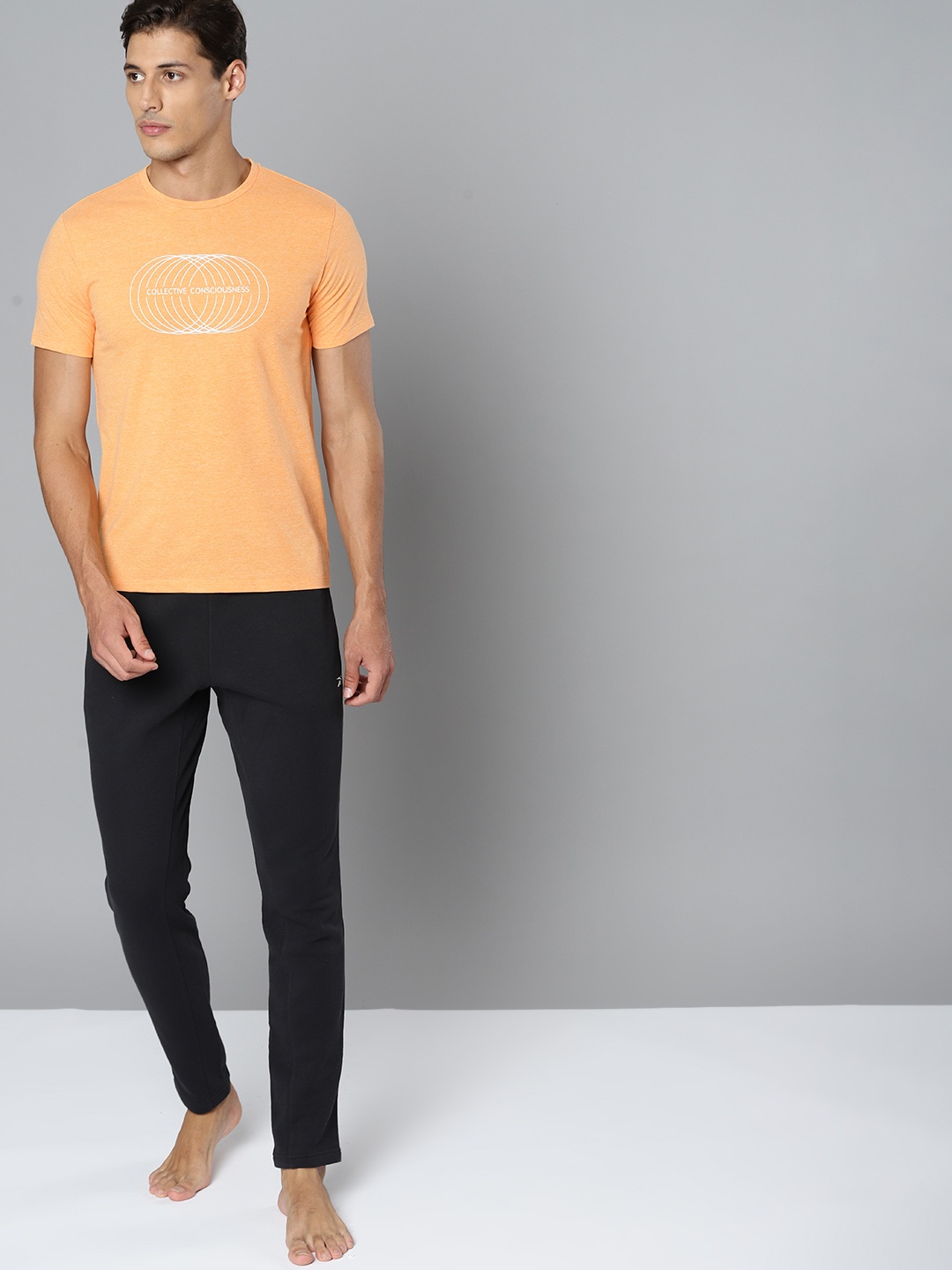 

HRX By Hrithik Roshan Yoga Men Orange Melange Typography Sustainable Tshirt, Peach