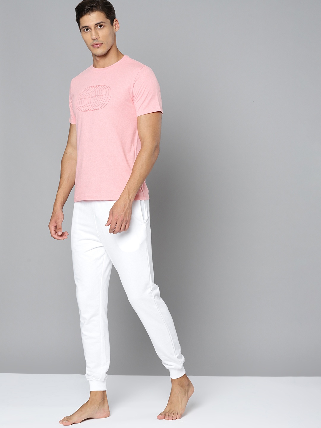 

HRX By Hrithik Roshan Yoga Men Pink Melange Typography Sustainable Tshirt