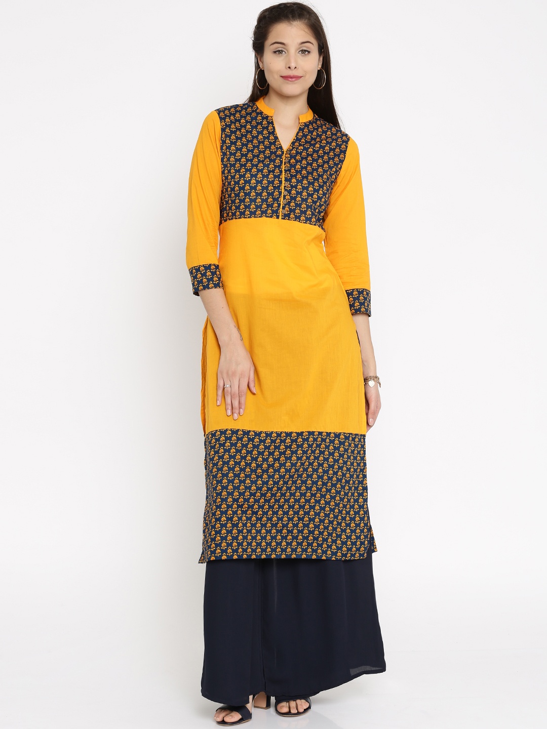 

Vishudh Women Yellow Solid Straight Kurta
